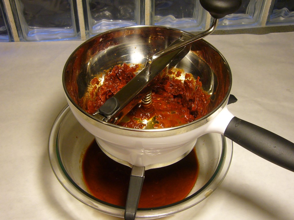 Red Chile Sauce in Food Mill